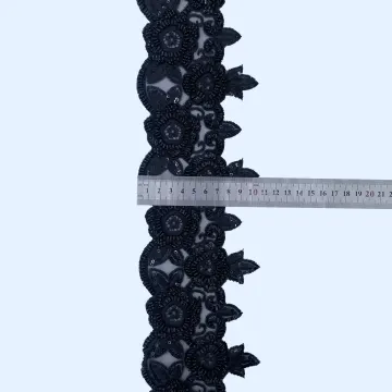 Black Linked Flower Mesh Border — Photographed sample with a ruler for reference; request confirmed finished dimensions before ordering