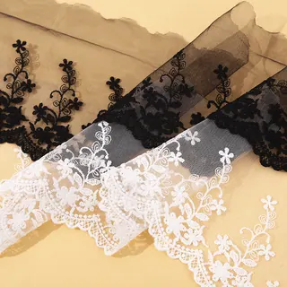 Black and White Floral Scallop Mesh Trim — Photographed decorative trim sample; verify colour and construction with a physical sample
