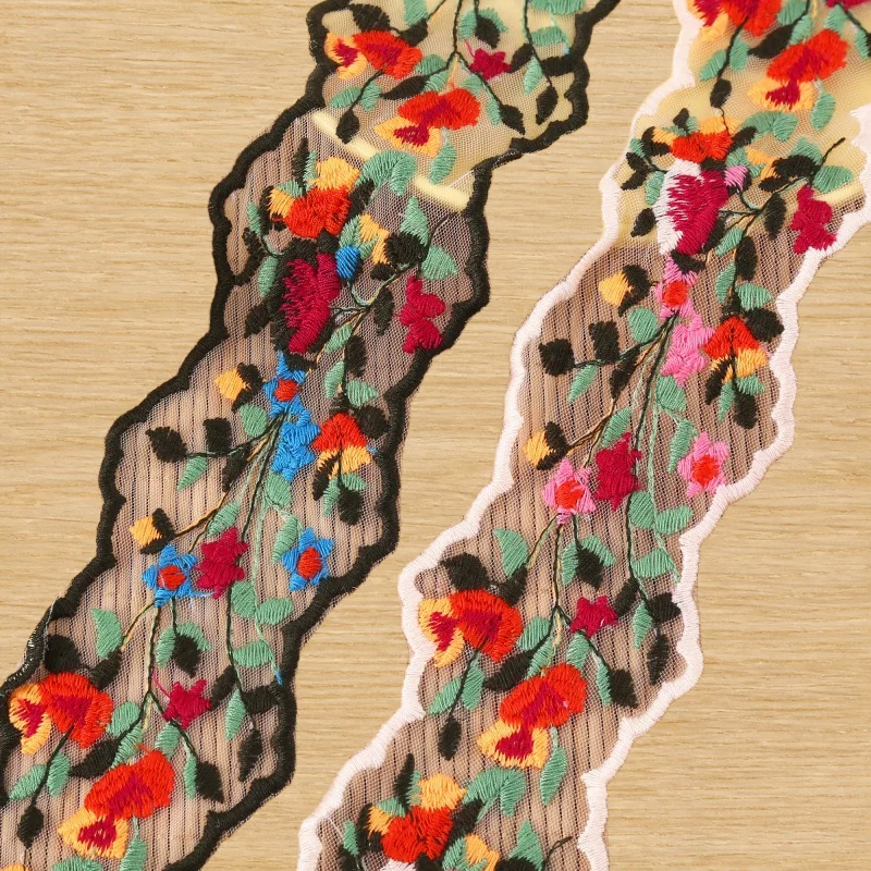 Bright multicolour flower garlands lace trim — Photographed decorative trim sample; verify colour and construction with a physical sample