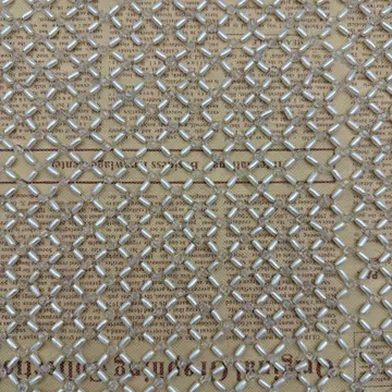 Diamond Grid Bead Embellished Fabric — Close-up of the photographed surface
