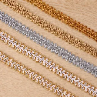 Gold and silver chevrons decorative trim — Photographed decorative trim sample; verify colour and construction with a physical sample