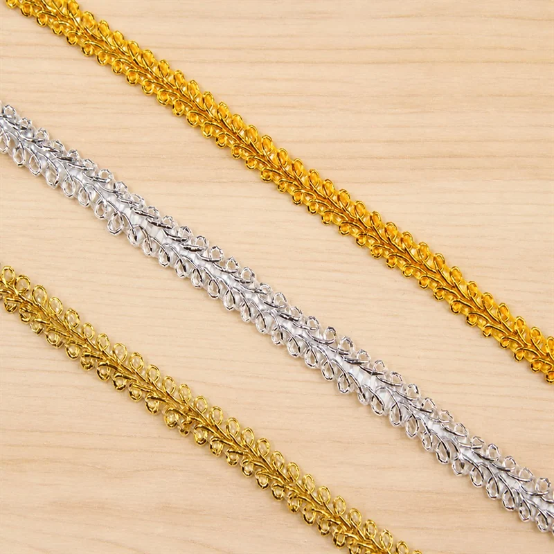Gold and silver leaf braid decorative trim — Photographed decorative trim sample; verify colour and construction with a physical sample