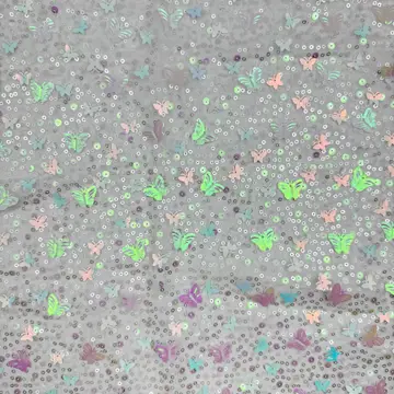 Iridescent Butterfly Sequin Mesh Fabric — Close-up of the photographed surface