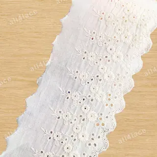 Ivory eyelet daisies openwork trim