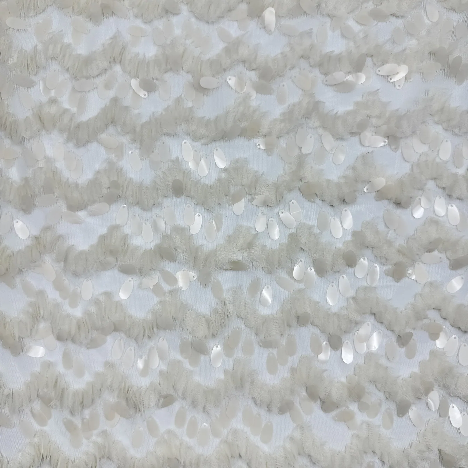 Ivory Wave Sequin Textured Fabric
