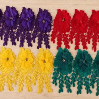 Jewel-Tone Floral Tassel Trim — Photographed decorative trim sample; verify colour and construction with a physical sample