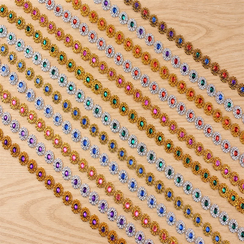 Multicolour bead-like dots hanging trim — Photographed decorative trim sample; verify colour and construction with a physical sample