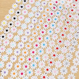Multicolour daisies floral appliqué — Photographed floral appliqué sample; verify size and construction with a physical sample