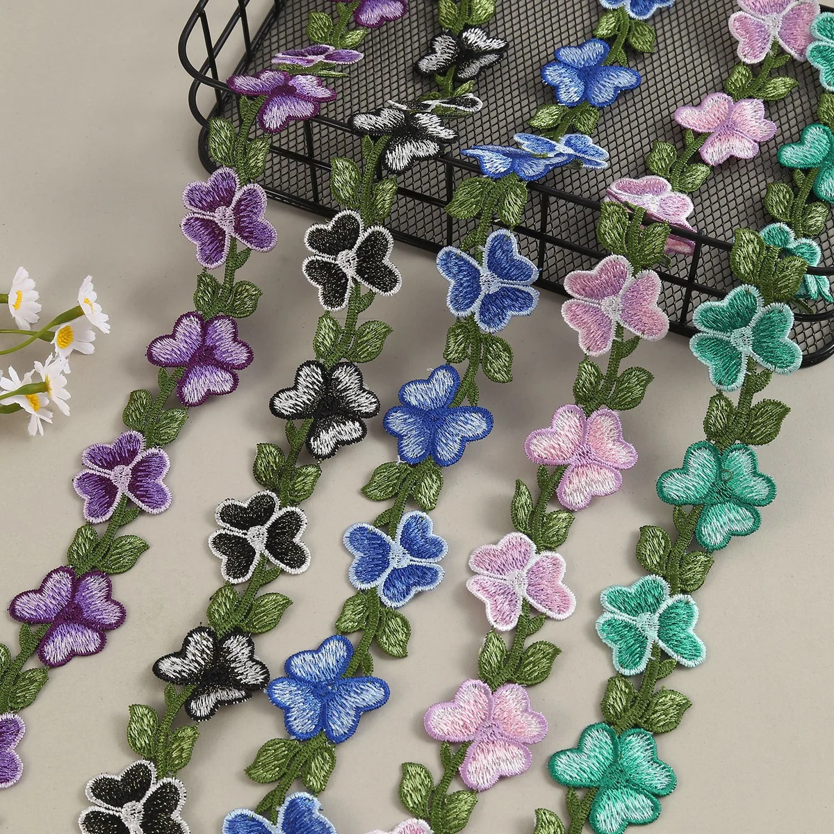 Multicolour Five-Petal Flower Vine Trim — Photographed decorative trim sample; verify colour and construction with a physical sample