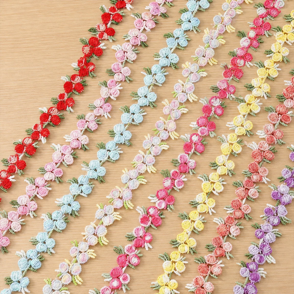 Multicolour Mini Flower Chain Trim — Photographed decorative trim sample; verify colour and construction with a physical sample