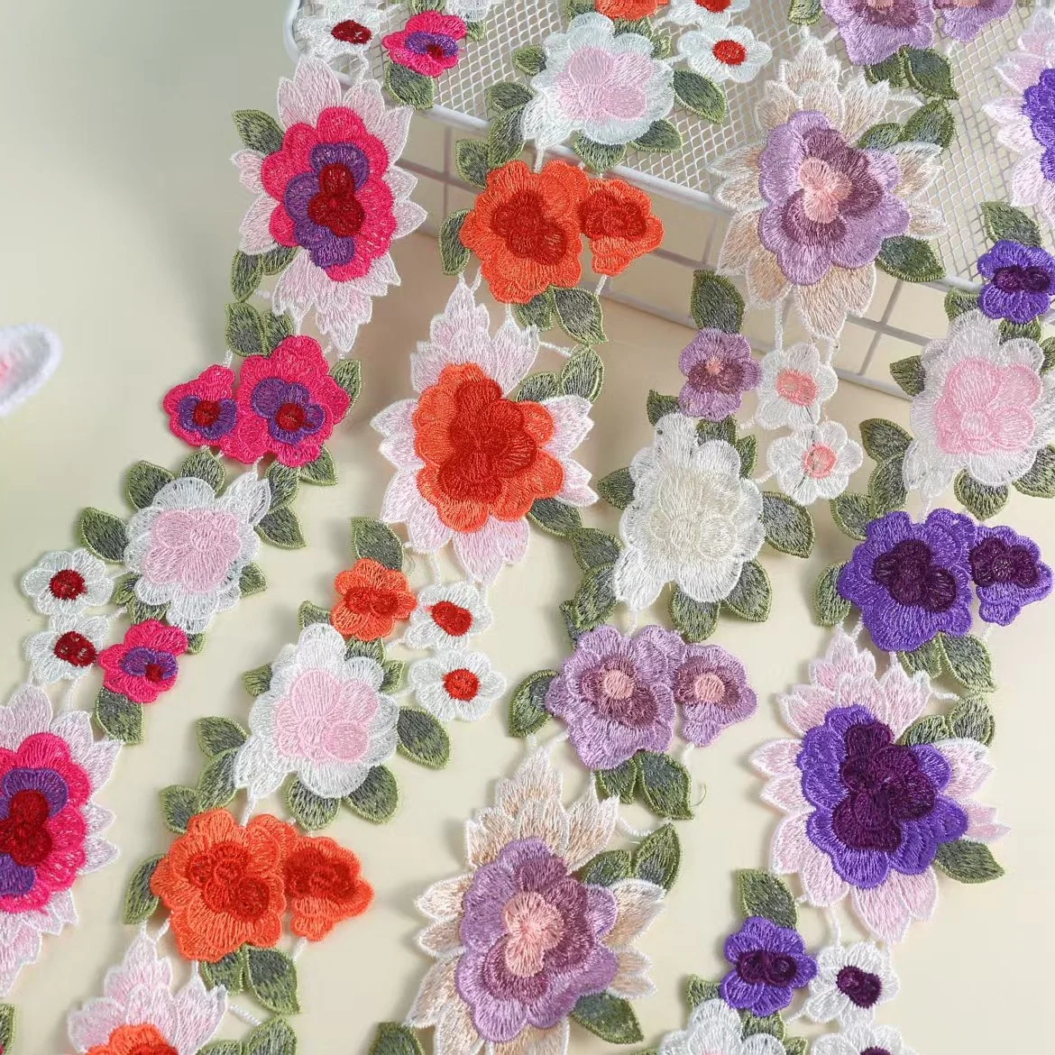 Multicolour Raised Flower Vine Border — Photographed decorative trim sample; verify colour and construction with a physical sample