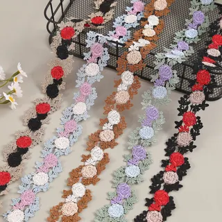 Multicolour ribbon roses lace trim — Photographed decorative trim sample; verify colour and construction with a physical sample
