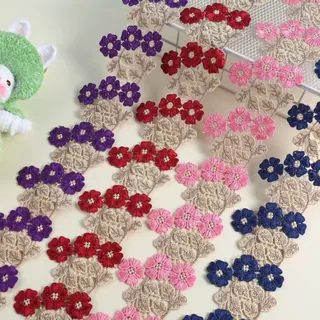 Multicolour Three-Flower Cluster Trim — Photographed decorative trim sample; verify colour and construction with a physical sample