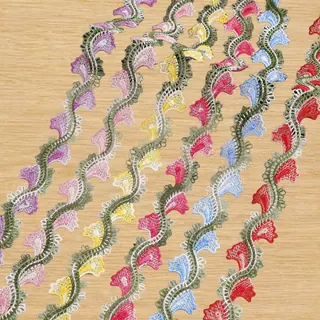 Multicolour wavy leaves lace trim — Photographed decorative trim sample; verify colour and construction with a physical sample