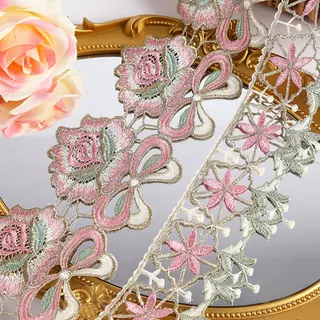 Soft pastel large blooms lace trim — Photographed decorative trim sample; verify colour and construction with a physical sample