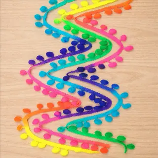 Rainbow tones bright pom-poms trim — Photographed decorative trim sample; verify colour and construction with a physical sample