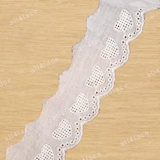 White cutwork shapes openwork trim