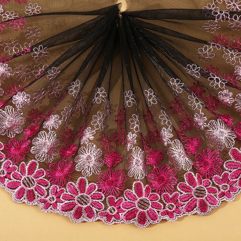 Wine and pink scalloped floral border tulle trim — Photographed decorative trim sample; verify colour and construction with a physical sample